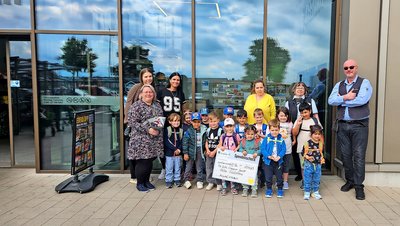 250627_bu_edeka_cramer_pfandspende_kita_suedstern